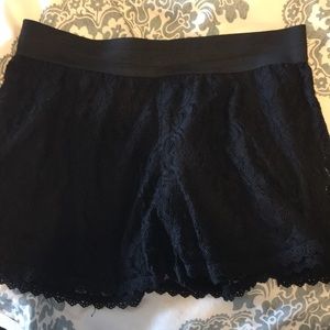 Black lace shorts.